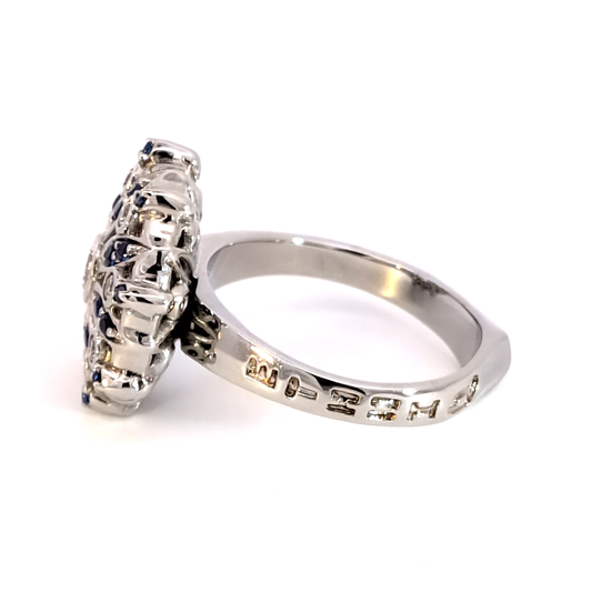 Diamond and Royal Blue Sapphire Halo Ring in Sterling Silver