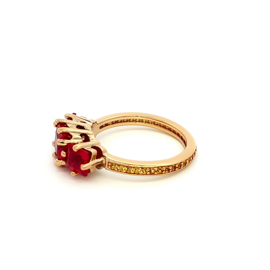 Yellow Gold Ring with Emerald Cut Red Rubies