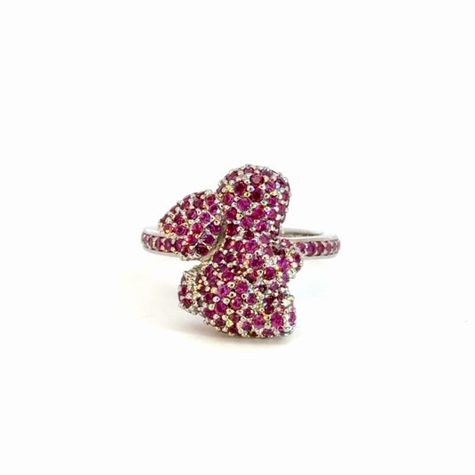 Ring with pink gemstones on a white background