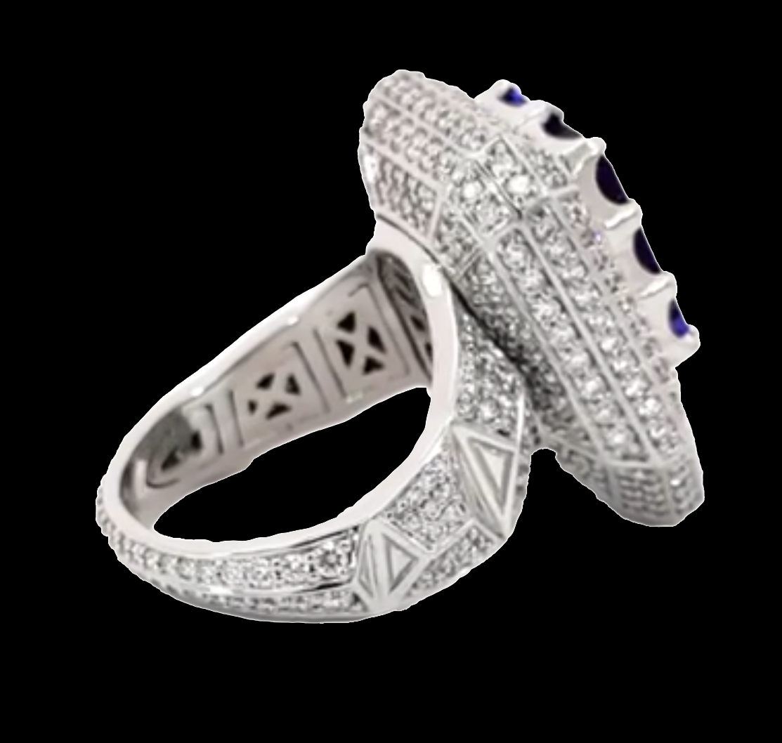 Elegant Giant Ring Full of Diamond Like Stones Surrounding the Blue Rectangle Stone