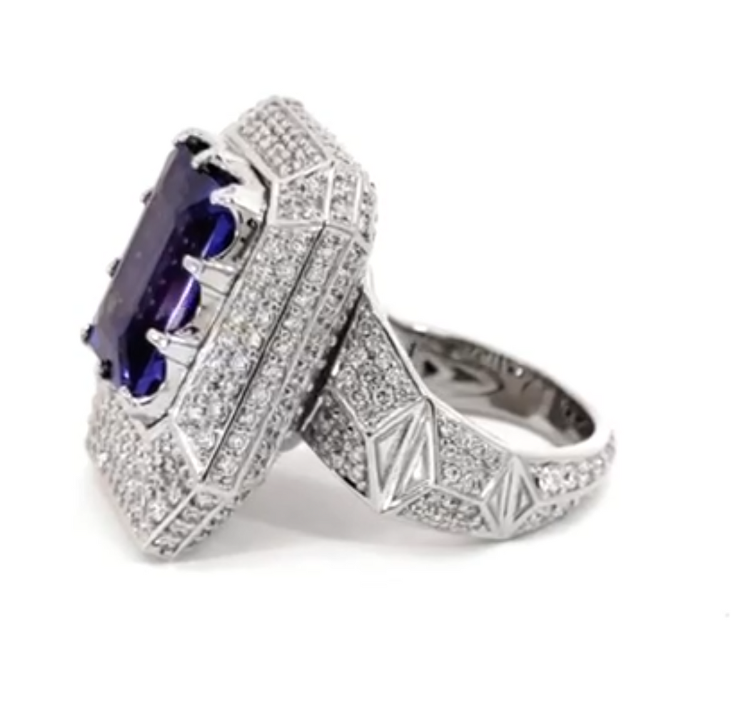Elegant Giant Ring Full of Diamond Like Stones Surrounding the Blue Rectangle Stone