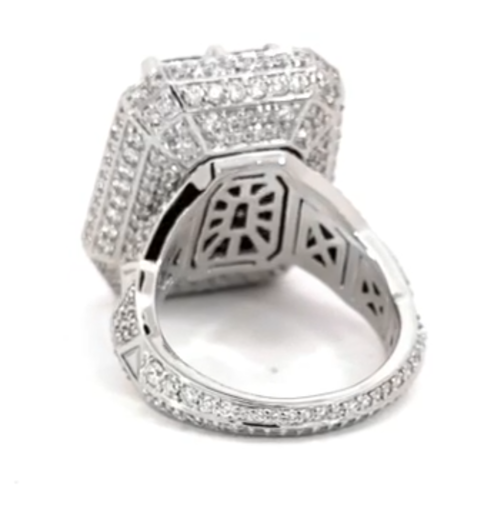 Elegant Giant Ring Full of Diamond Like Stones Surrounding the Blue Rectangle Stone
