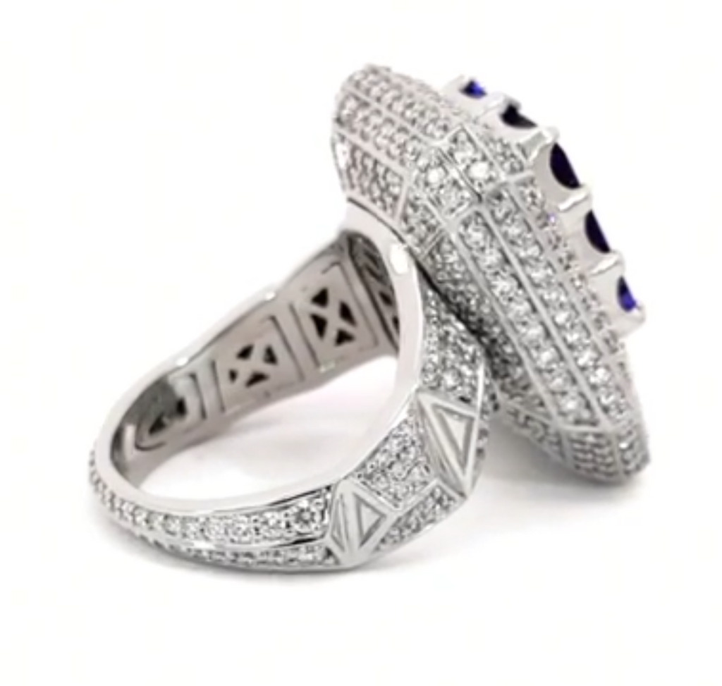 Elegant Giant Ring Full of Diamond Like Stones Surrounding the Blue Rectangle Stone