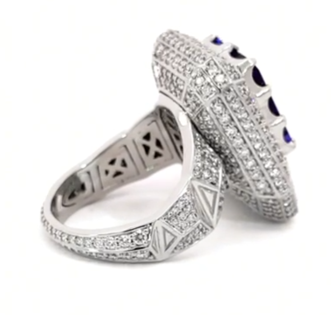 Elegant Giant Ring Full of Diamond Like Stones Surrounding the Blue Rectangle Stone