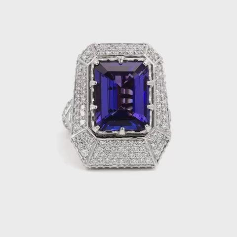 Elegant Giant Ring Full of Diamond Like Stones Surrounding the Blue Rectangle Stone