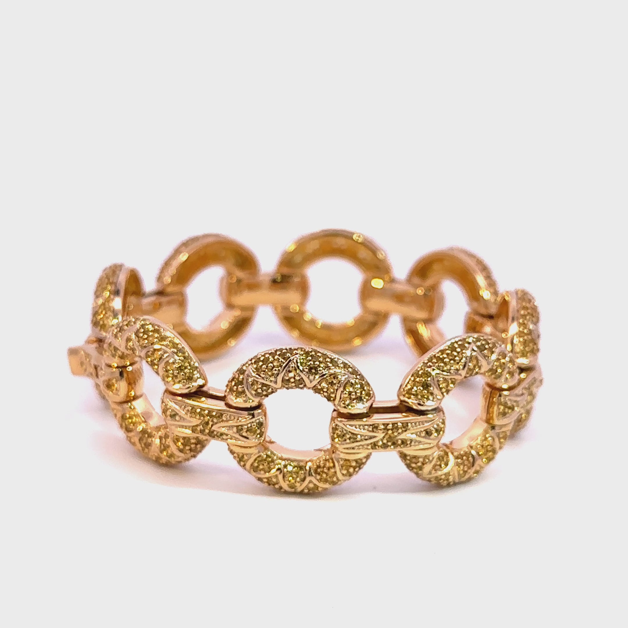 Stone Bedecked Circular Gold-plated Bracelet